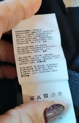 Abito nero con fantasia animalier