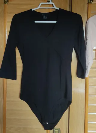 Lote 3 bodys (negro, azul y rosa)