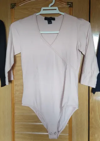 Lote 3 bodys (negro, azul y rosa)