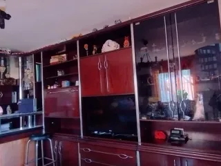 Mueble de comedor madera oscura