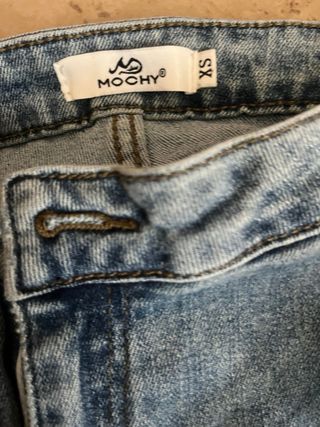 Jeans a zampa con cintura