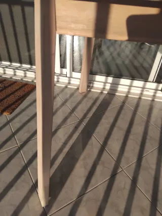 Mesa de jardín extensible de madera.