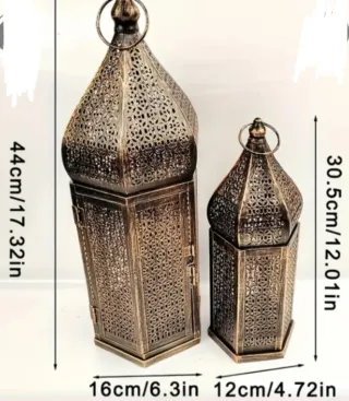 Faroles de decoración dorados y negros