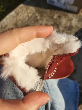 Botas Clarks com pelo e estrelas