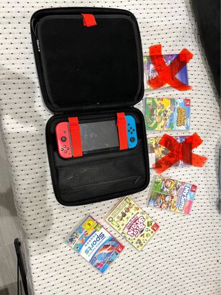 Nintendo Switch + 4 Juegos + maletin de transporte