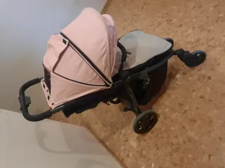 Carro de bebé Niu rosa y gris