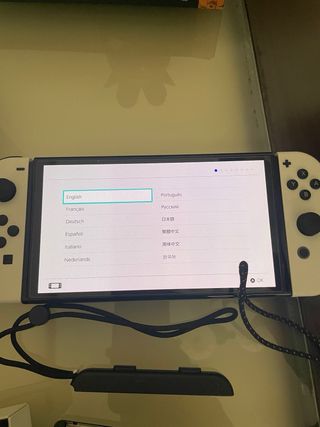 Nintendo Switch OLED Blanca + 2 juegos + funda