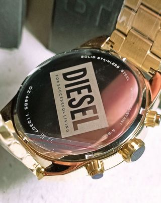 Reloj Diesel Spiked nuevo dorado y verde