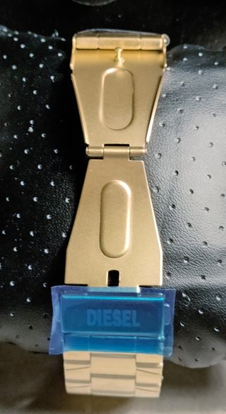 Reloj Diesel Spiked nuevo dorado y verde