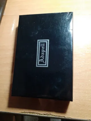 Cartera de mujer negra con hebillas Adapell