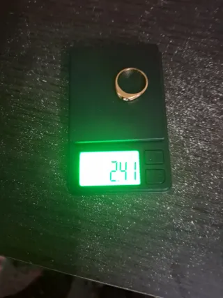 Elegante alianza de oro 18k con 2 diamantes