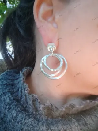 Pendientes Uno de 50