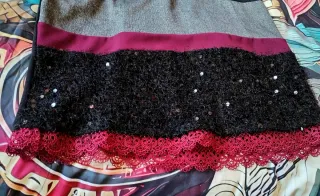 Abito nero e grigio con paillettes