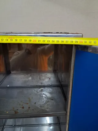 Mueble de espejo metálico azul