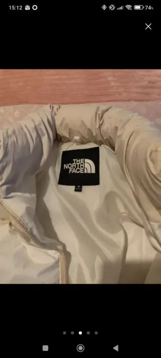 Plumífero The North Face beige y tostado. Nuevo