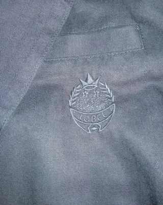 Americana azul/morada nueva