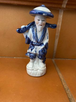 Pescador chino porcela antiguo.