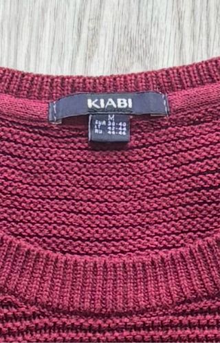 Jersey granate con flecos