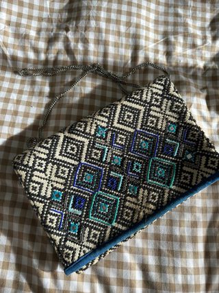 Bolso de tapicería con pedrería