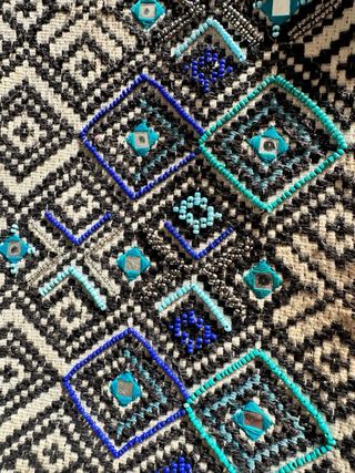 Bolso de tapicería con pedrería