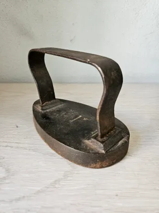 Plancha antigua de hierro