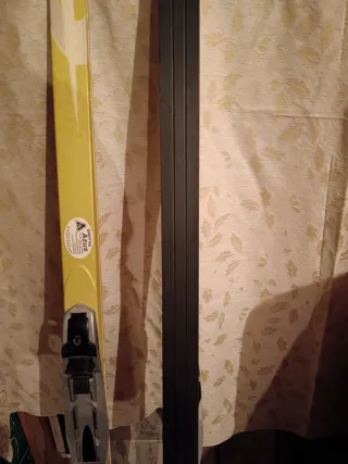 Esquís Skating Rossignol Junior y Bastones