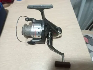 Carrete pesca y maletín accesorios