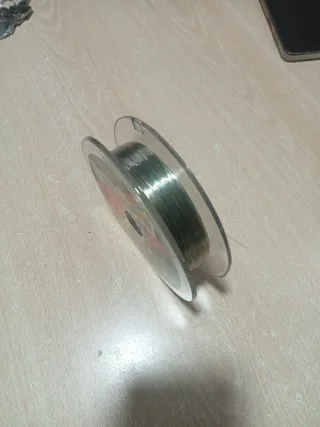 Carrete pesca y maletín accesorios