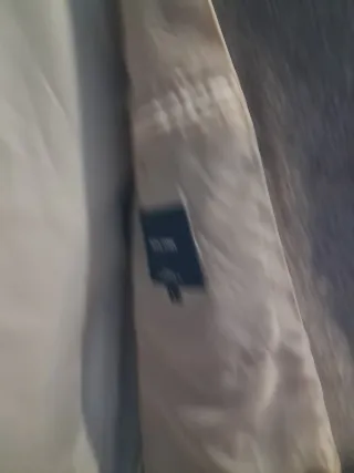 Chaqueta chico gris con capucha