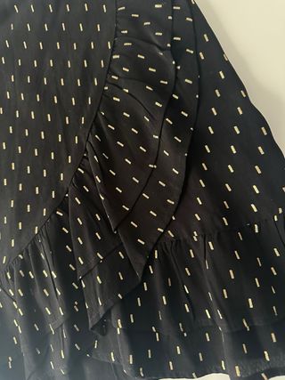 Minifalda negra con detalles dorados