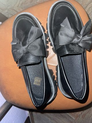 Mocasines negros con lazo