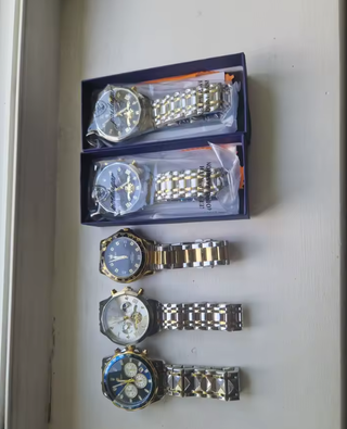 Reloj Poedagar Azul y Dorado