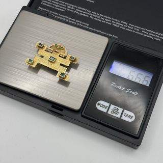 Broche colgante de oro 18kt con esmeraldas