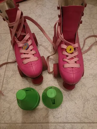 Patines rosas para niña talla 35 con su mochila