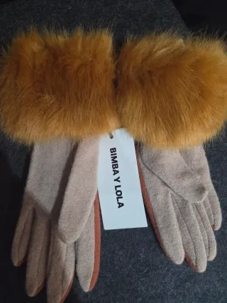 Guantes de lana con pompón
