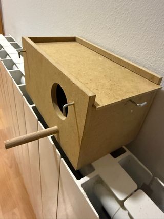 Nido para pájaros de madera