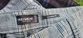 Pantalones de cuadros grises y morados