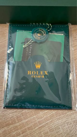 Reloj Rolex de Lujo Negro y Plateado