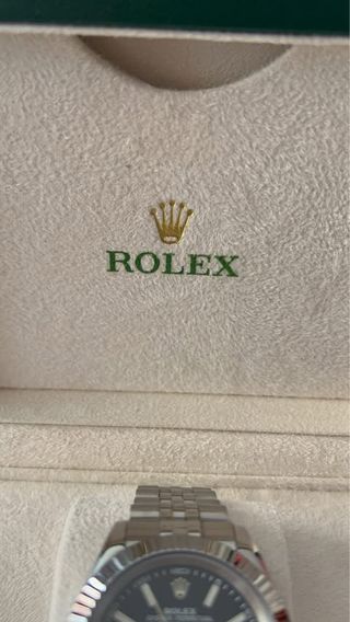 Reloj Rolex de Lujo Negro y Plateado
