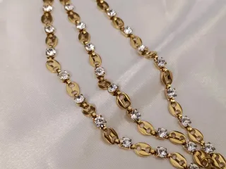 Conjunto Collar y pulsera acero bañado en oro 18K