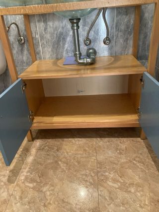 Mueble de baño con lavabo de cristal