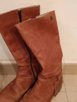 Botas altas y media caña marrones