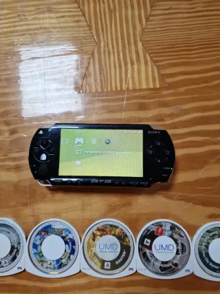 PSP Sony + 7 UMDs