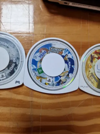PSP Sony + 7 UMDs