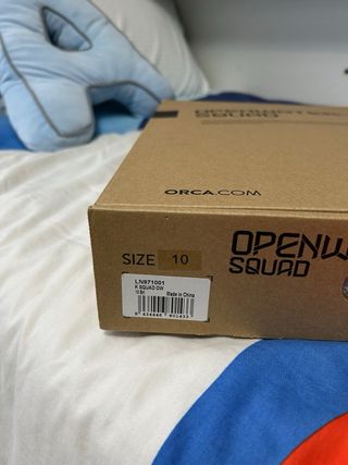 Traje de neopreno Orca naranja y negro