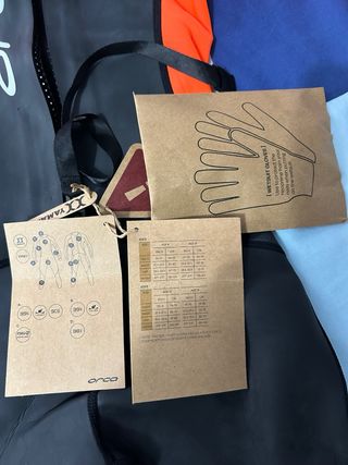 Traje de neopreno Orca naranja y negro