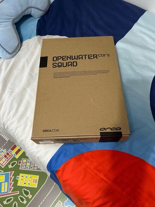 Traje de neopreno Orca naranja y negro