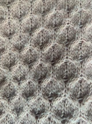 Poncho de lana rosa