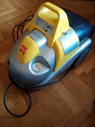 Aspiradora con centro de planchado