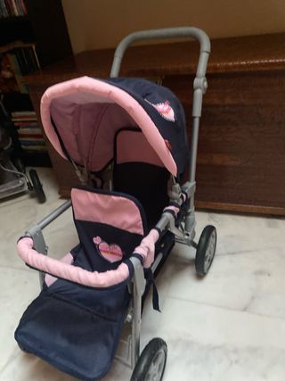 Carrito gemelar de juguete rosa y azul